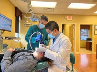 young person getting orthodontic treatment from Align Beauty Orthodontics